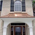 Крыша входной группы выполнена из американской меди Amerimax®